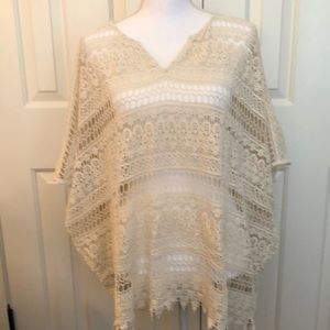 CAbi crochet poncho or beach cover up. Great for layering or over swimsuit